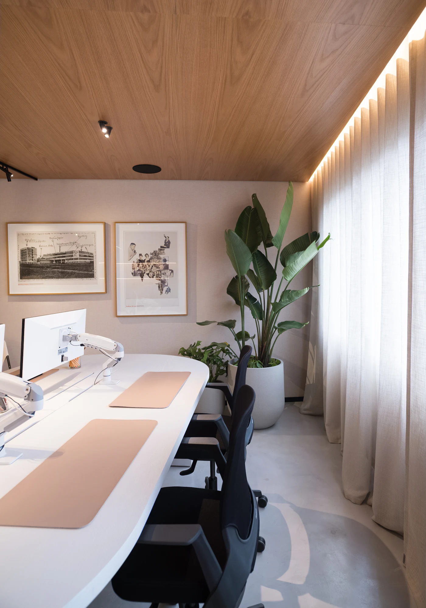 Warm, welcoming office lounge with soft seating and natural light